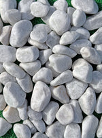 Ciottoli in Bianco Carrara: Eleganza e Versatilità per i Tuoi Spazi - Notaro Manufatti